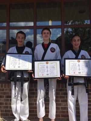 3 friends trained hard together for 8 years earned their blackbelts at same time..