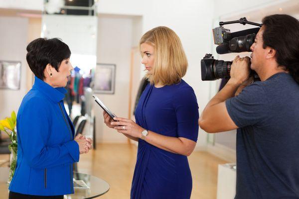 Partnering with the news team for author Marilynn Barber's book release in a River Oaks boutique.