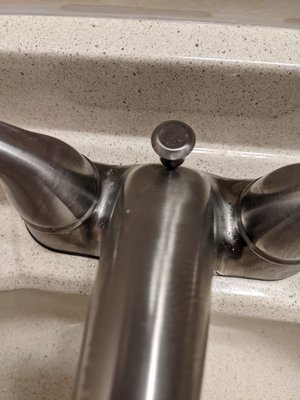 Dirt on bathroom faucet