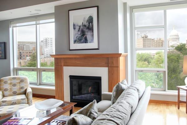 Wood fireplace surround in downtown Madison high rise condo