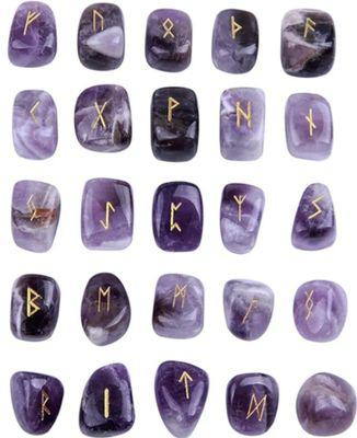 Rune stones are a traditional divination tool. These are carved into amethyst.