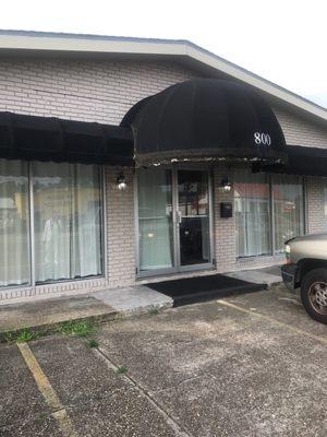 Simple awning marks the venue entrance