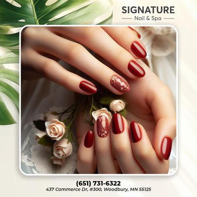 This deep red manicure with lace accent nails is the perfect combination of sophistication and style. Treat yourself to a luxurious look a