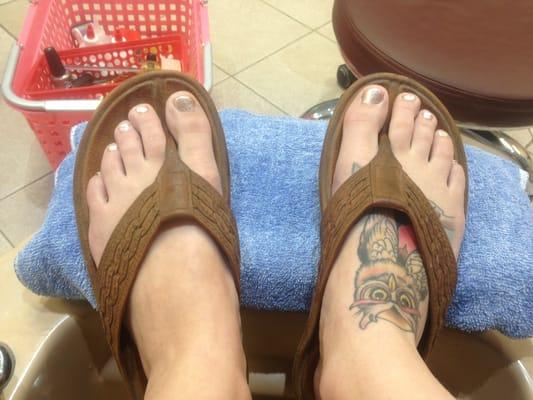 My pretty gold nail polish with my man sandals :-)