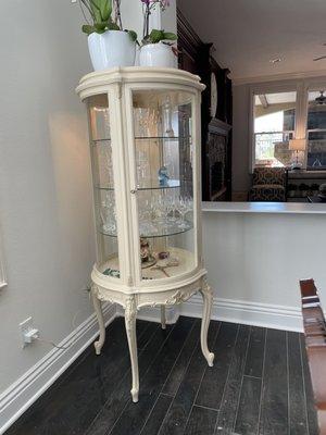 100-year-old curio cabinet from husband's great grandmother repainted Ecru.