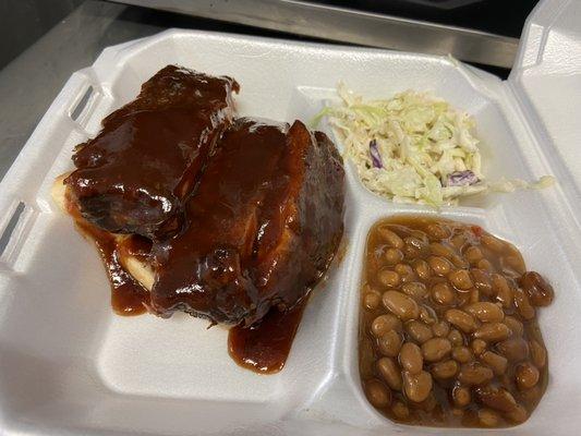 Ribs with sauce and sides