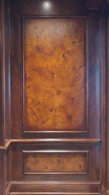 faux burl and wood grained panels and mahogany wood grained walls