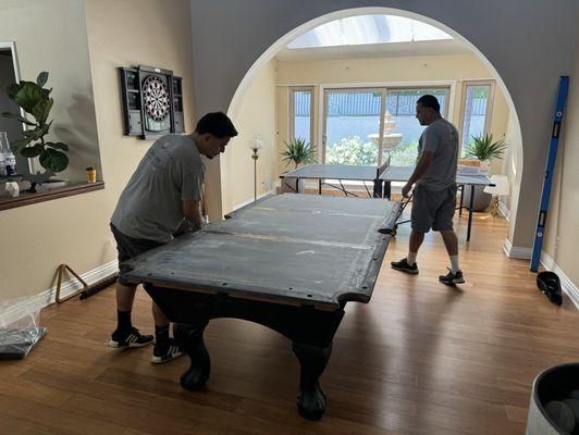 Frank and his brother setting up table