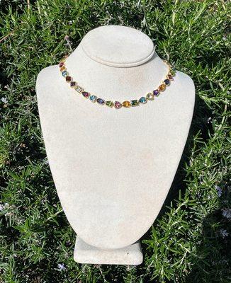 Spectacular 14K yellow gold necklace with 44c.t. total weight of colored stones on sale now call or stop in for more info!