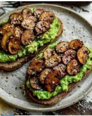 Vegetarian Sandwich : Caribbean seasoned mushrooms with avocado slices or guacamole on a Toasted baguette