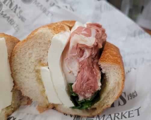 Proscuitto Di Parma Sandwich, sliced imported proscuitto from parma italy with extra vrigin olive oil, fresh mozzarella & basil