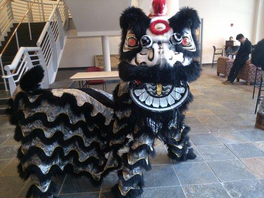 The ancient Lion dance ritual used to drive away evil spirits.