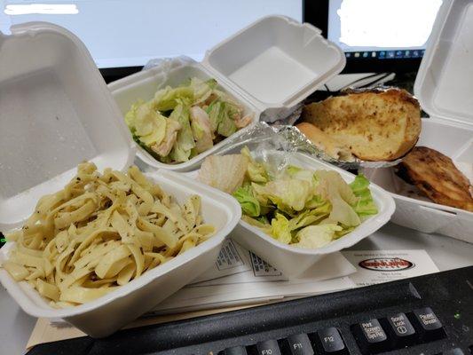 Dry fettucine alfredo with no alfredo sauce, rotten lettuce, no salad dressing, burned/deep fried calzone and garlic bread with no olive oil