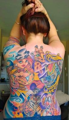 Circus back piece by Richard Garcia at Legacy Arts Tattoo!