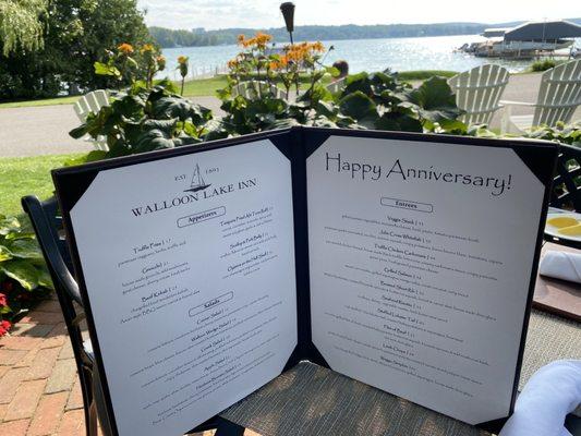 Anniversary menu with view of Lake Walloon