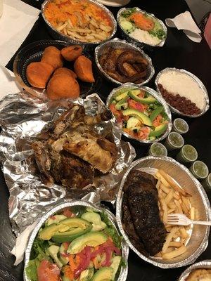 Spanish rice, empanadas, maduros, rice & bean, roasted chicken, skirt steaks, avocado salads