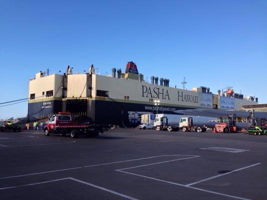 PASHA Hawaii Jean Anne docked to pick up US Army UH-60 Blackhawk helicopters.