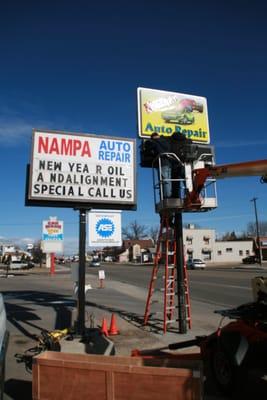 Changing our old sign for high tech!