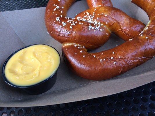 Pretzel with cheese dip