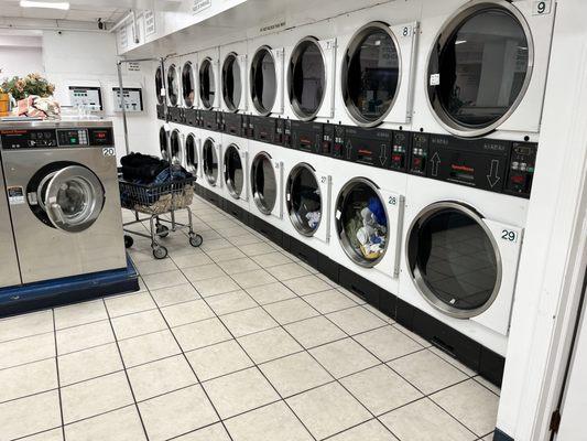 Dryers along the side wall.