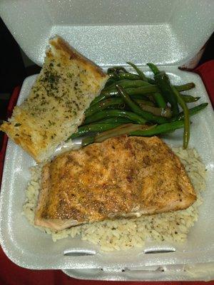 Lemon and herb salmon over seasoned rice with fresh green beans