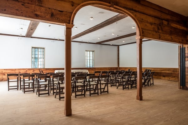 Interior of our newly renovated 1793 Carriage House! Inside capacity is 90 and can be expanded with an additional tent.