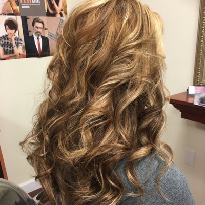 Color/Style done by our stylists. Added volume/length with a Halo Couture extension.