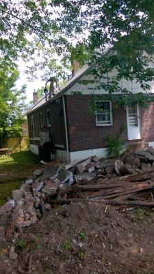 Roof and gutter cleaning with a leaf blower.