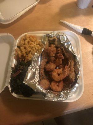 The seafood sampler with scallops, shrimp and whiting with Mac and cheese and greens