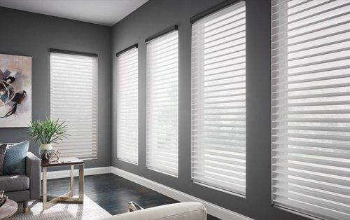 Looking to add character and utility to your home?  Explore window coverings like cellular shades, natural woven shades, and wood blinds, am