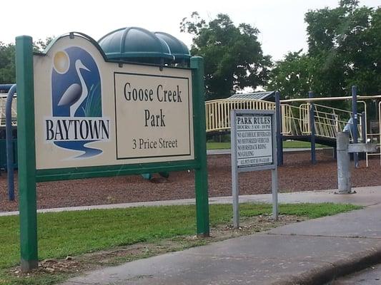 Sign and playground behind