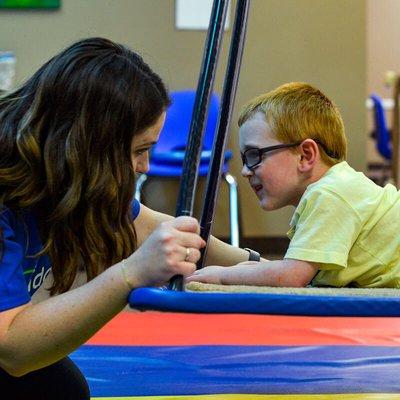 Hopebridge kiddo with BCBA during ABA therapy.