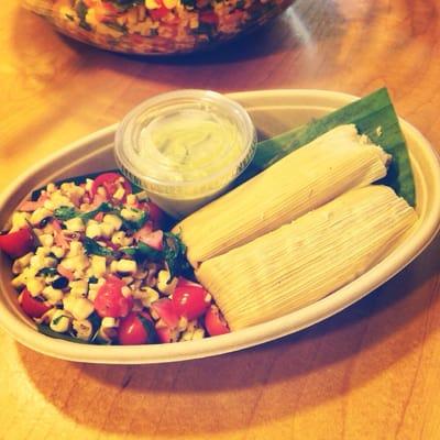 Lemongrass pulled pork tamales with avocado salsa verde and fire roasted summer corn salad ($10)