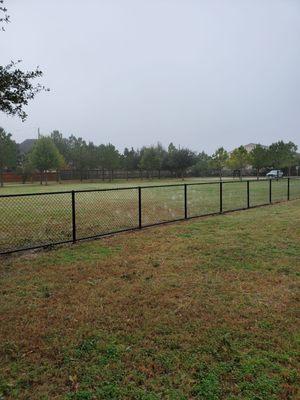 Taken from corner of small dog side, showing parking area available