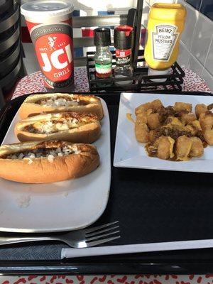 One original hot dog, with onions and chili. Two original hot dogs with cheese. Also chili cheese tots for a side