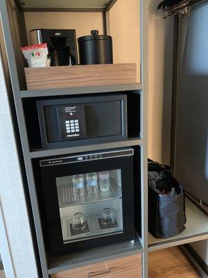 Coffee, safe, and refrigerator. Refrigerator has two free 10oz. water bottles