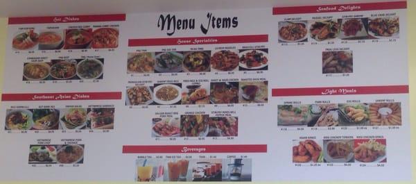 Menu on the wall.  I love how they have a picture next to the food