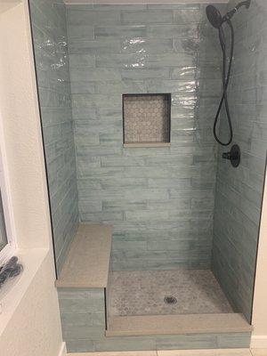 This was our shower before the glass and door was out in.