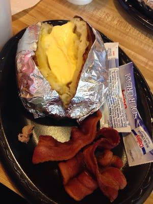 Baked potato with sour cream and bacon. Very literal and not the CA potato I was expecting.$4