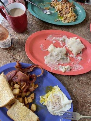 Corn beef hash, eggs, bacon, home fries, hash browns, toast, biscuits and gravy and coffee