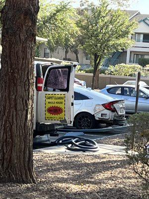 They parked in the handicap parking which you can see beyond the blue hose.