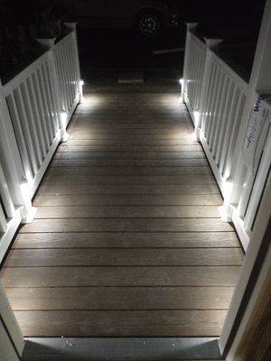 Outside deck and walkway with outside lighting.