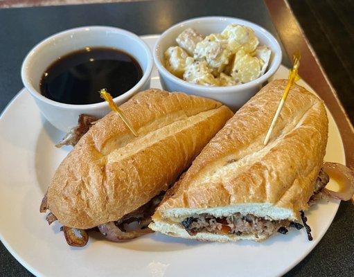 Excellent French Dip with a tasty Au Jus and potato salad.