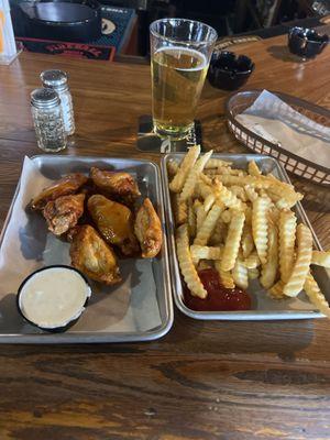 Mango Habanero wings with an order of fries ledder rip