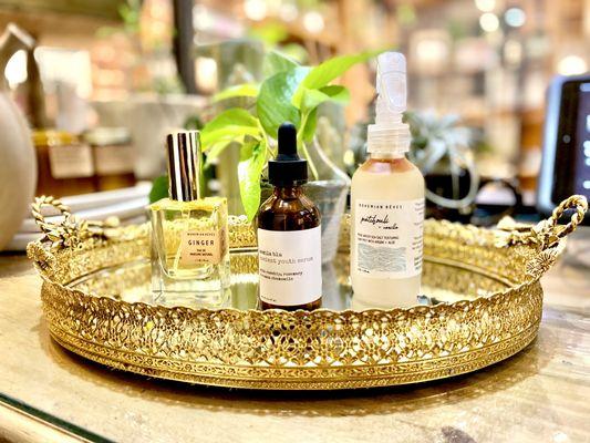 Natural based skincare, perfumes and hair care products displayed on a fabulous vintage vanity tray!