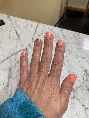 Gel polish with the pointer finger being dipped 1st to strengthen it. I love this place!