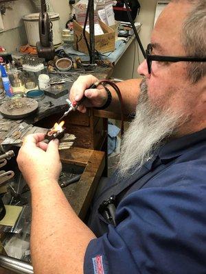 This is Bob Lanier, our award-winning goldsmith. Bring your beautiful jewelry to have repaired in-house or have Bob create a custom design!