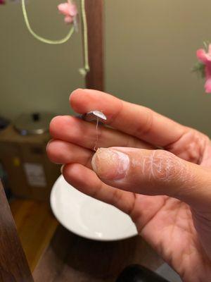 Evidence. EMA should flake off the nail when soaked in 100% acetone. Illegal MMA turns slimy/goopy, which is happening here.