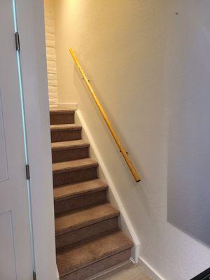 We resecured this banister to the studs after it had been mounted inproperly and ripped off the wall.