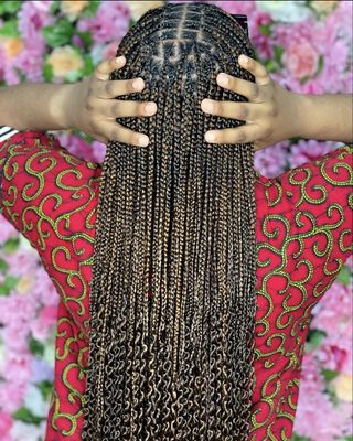 Knotless box braids with a perfectly curled bottom.